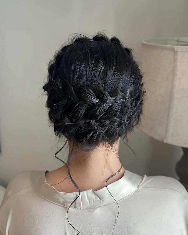 14. Soft Black Crown Braid Chignon - Crown Braid Hairstyles