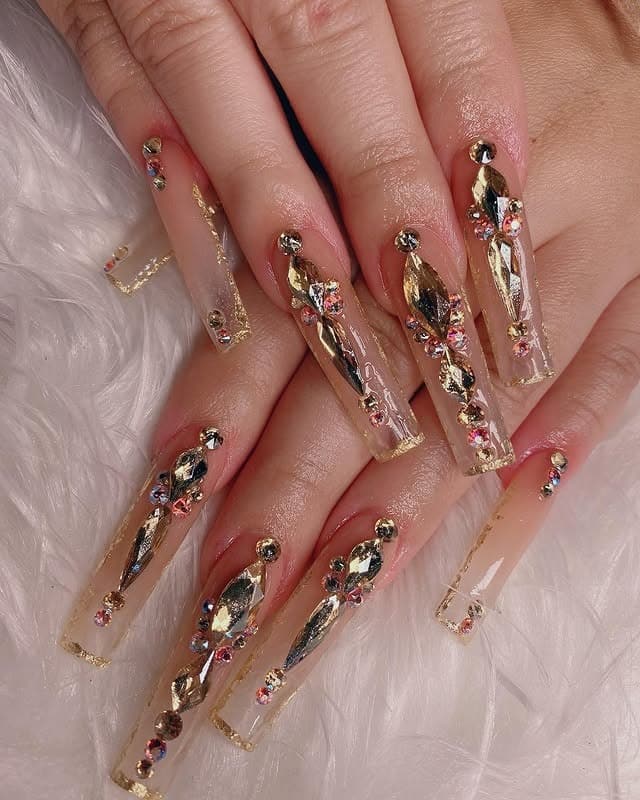 7. Gold Crystal Clear Coffin Nails - long nail ideas
