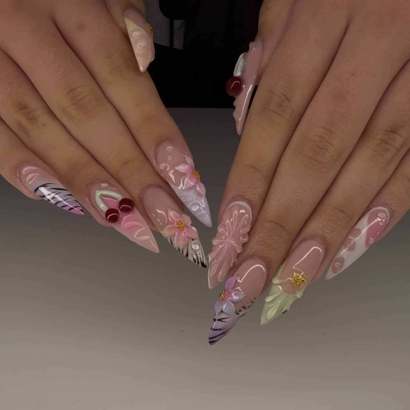 8. Pastel 3D Floral Stiletto Nails - long nail ideas
