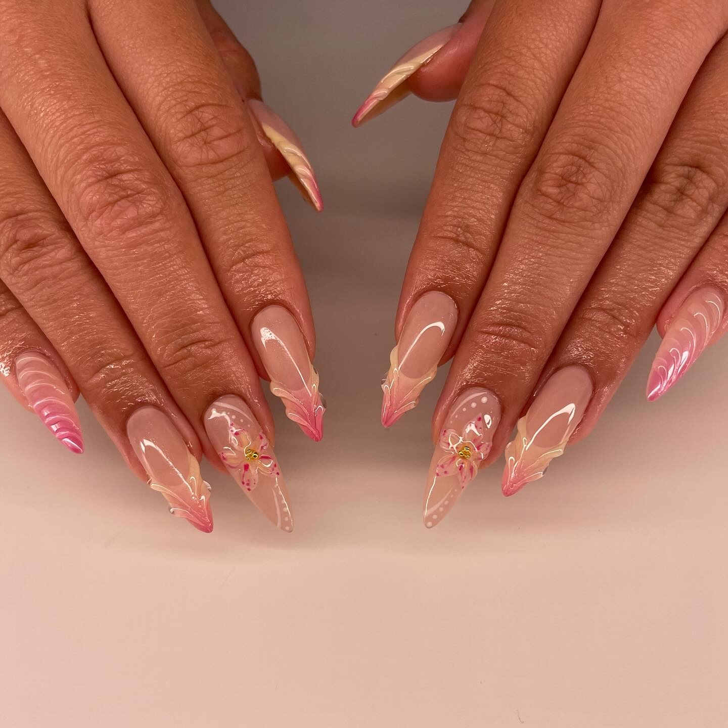 16. Soft Pink Floral Stiletto Nails - long nail ideas