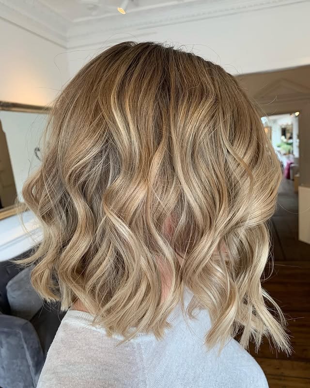 1. Beige Blonde Wavy Midi Bob - Midi Cut Hairstyles