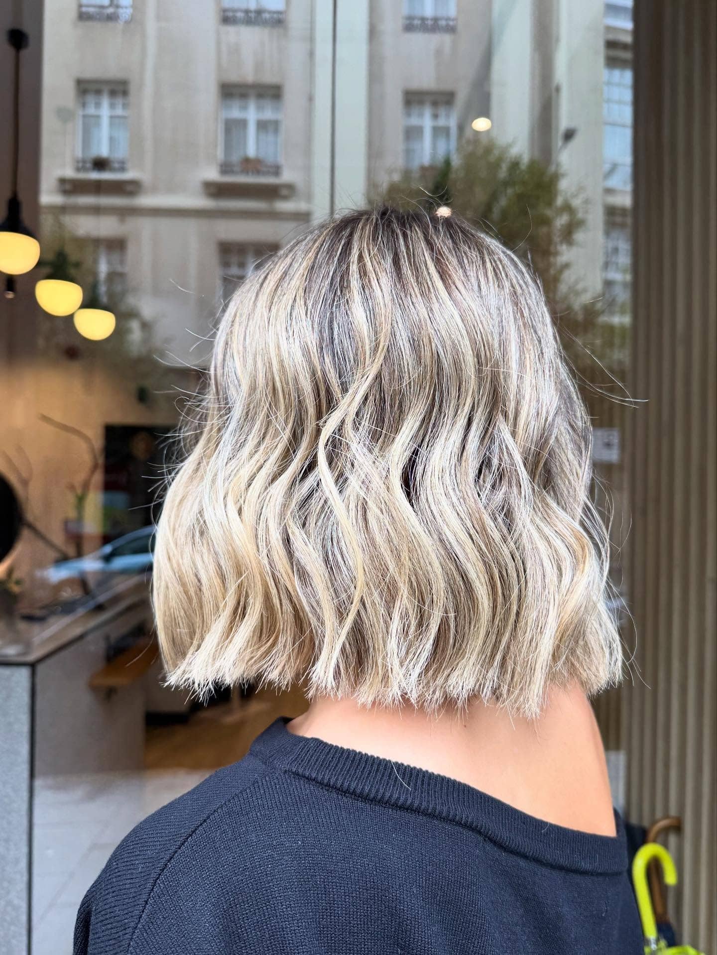 8. Icy Blonde Textured Midi Bob - Midi Cut Hairstyles