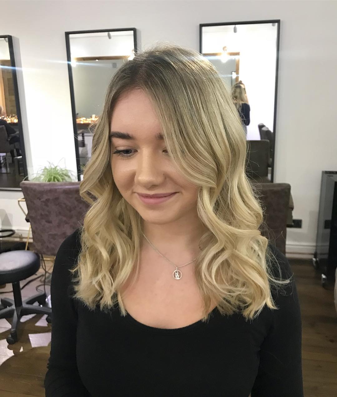 12. Rooted Vanilla Blonde Wavy Midi Cut - Midi Cut Hairstyles