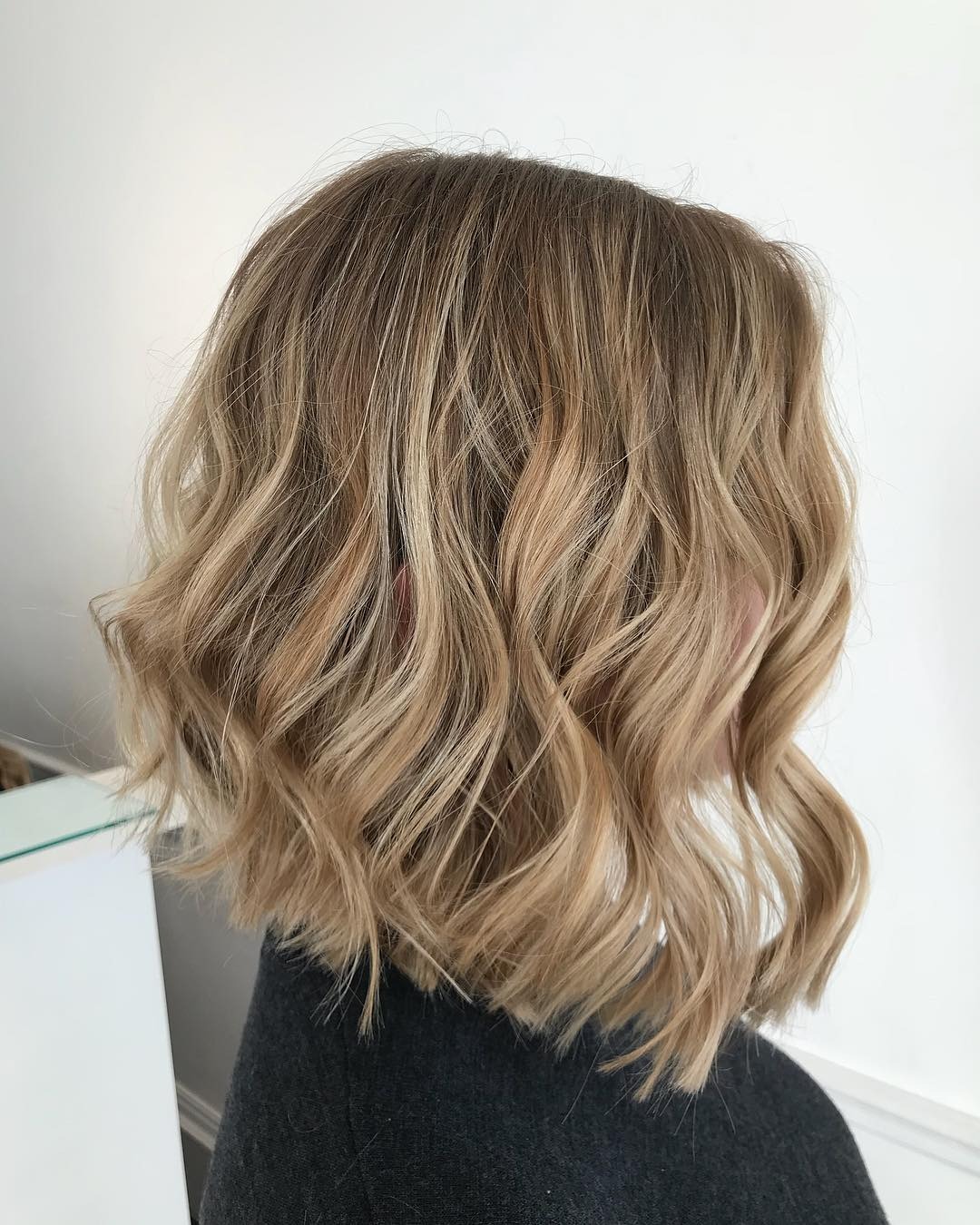16. Honey Blonde Wavy Midi Bob - Midi Cut Hairstyles
