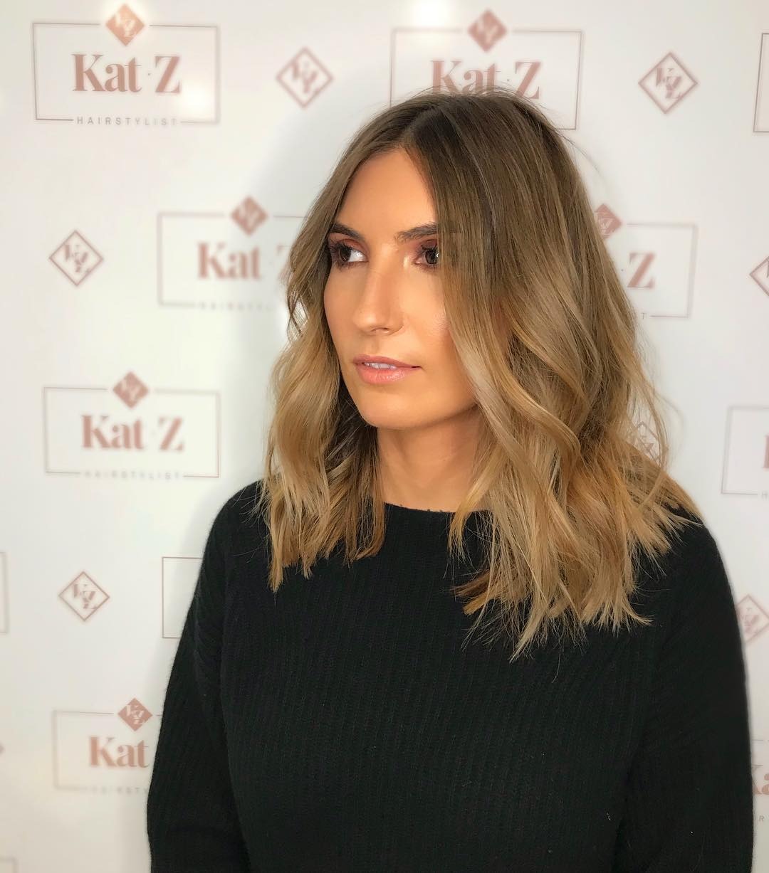 21. Beige Blonde Balayage Midi Cut with Soft Waves - Midi Cut Hairstyles