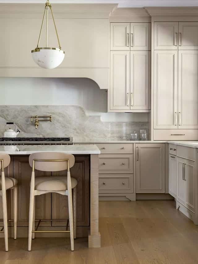 15. Greige Transitional Kitchen with Marble Details - elegant kitchen ideas