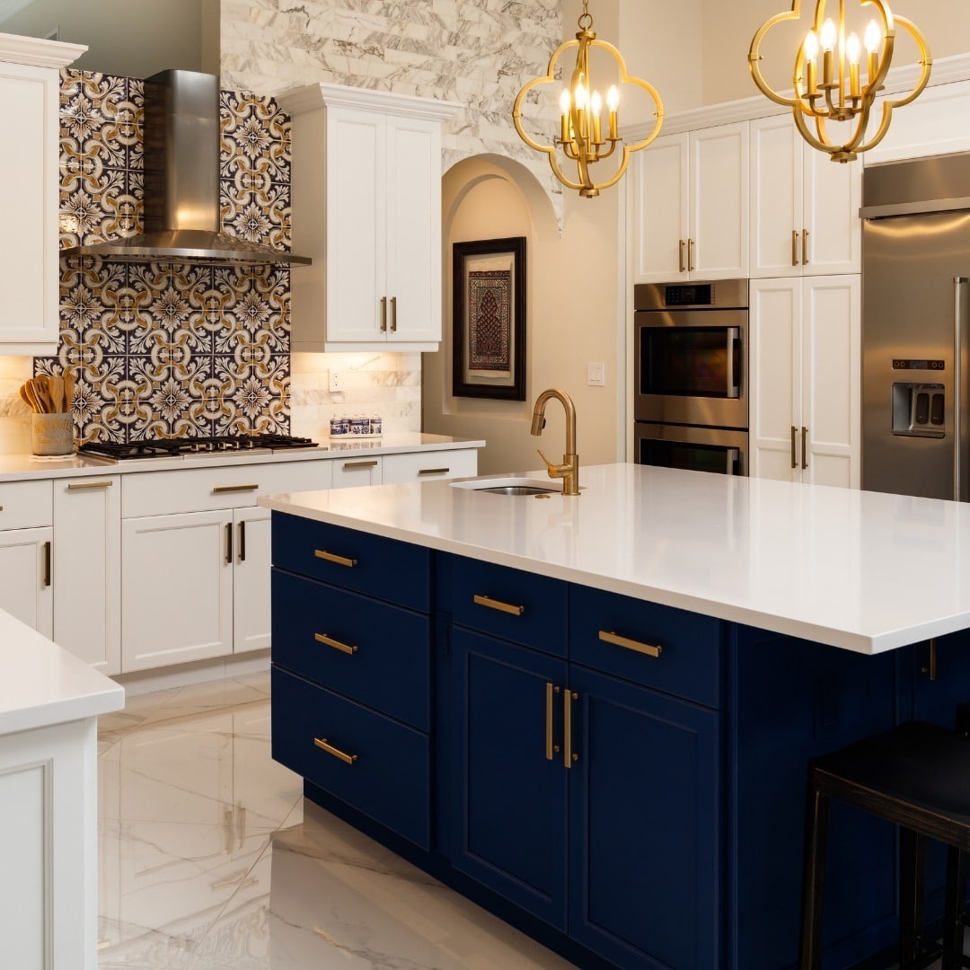 22. Navy Blue and White Kitchen with Decorative Tile Backsplash - elegant kitchen ideas
