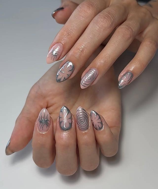 4. Blush Pink and Silver Abstract Almond Nails - silver nail ideas