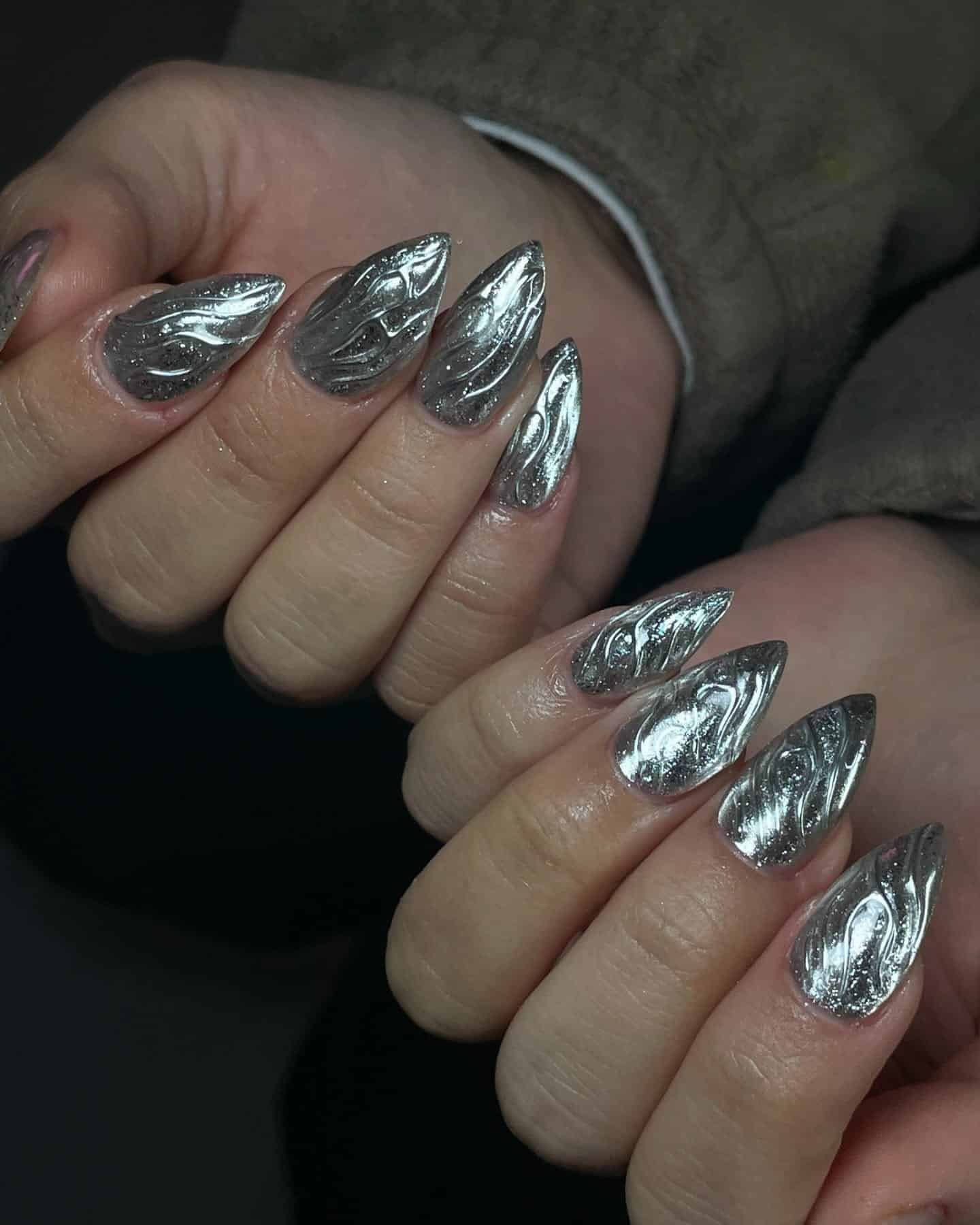 5. Mirror Silver Chrome Stiletto Nails - silver nail ideas