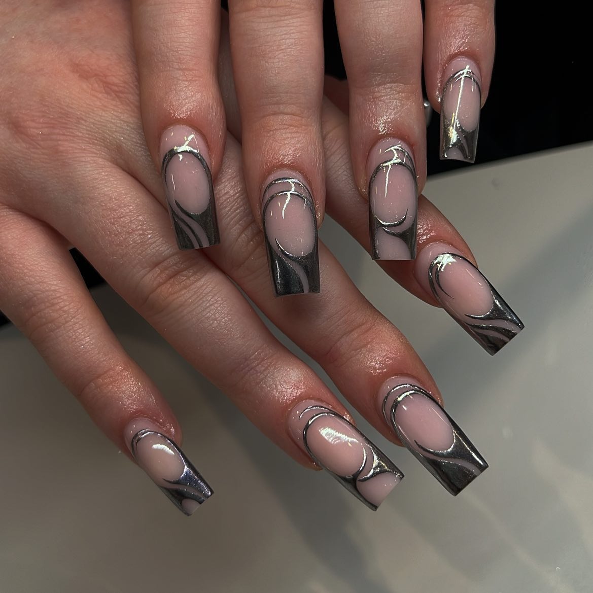 13. Silver Chrome Swirl Square Nails with Nude Base - silver nail ideas