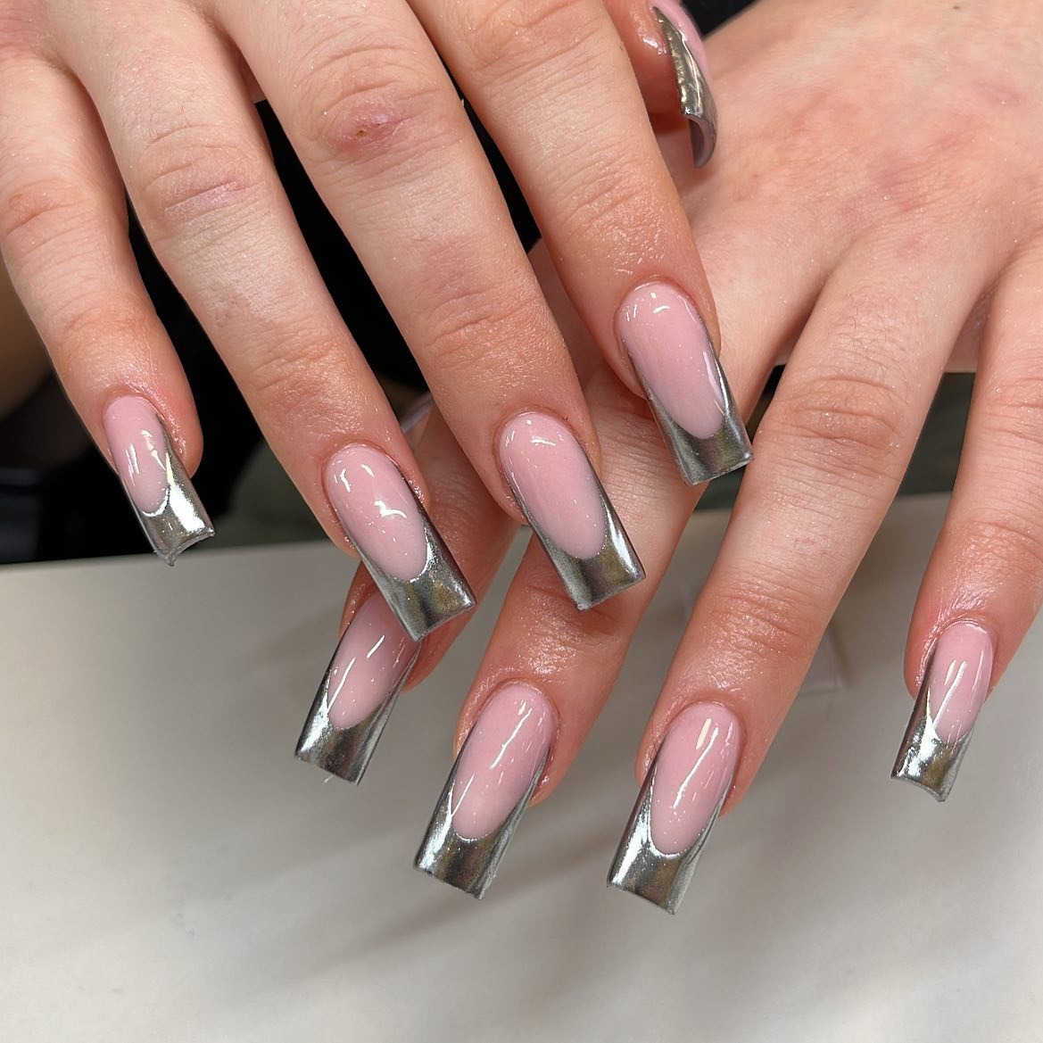 16. Silver Chrome French Coffin Nails with Nude Base - silver nail ideas
