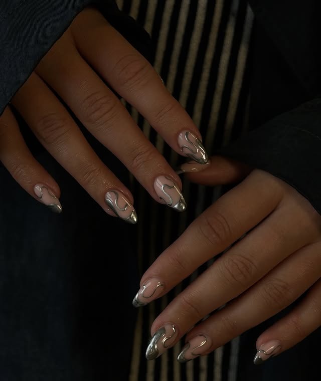 19. Silver Chrome Swirl Almond Nails with Metallic Tips - silver nail ideas