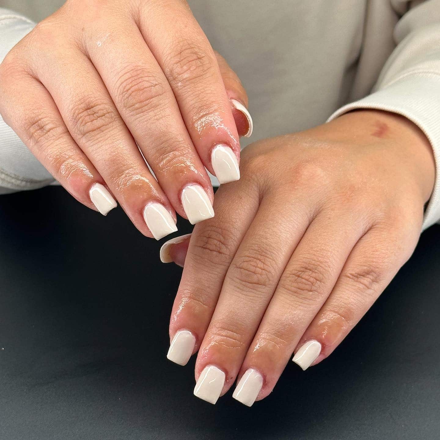 5. Glossy Milky White Short Square Nails - simple fall nail ideas
