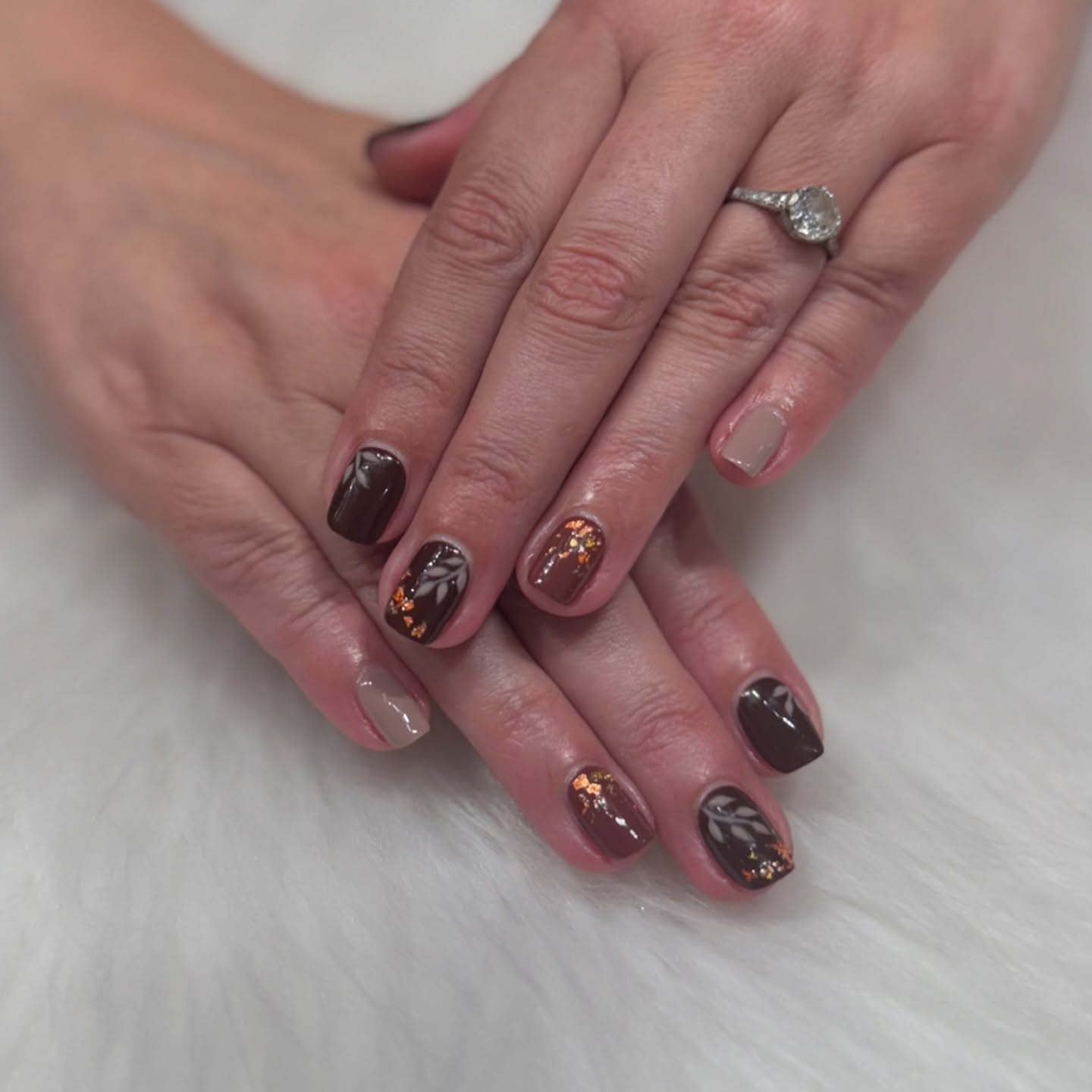 18. Short Brown Glossy Nails with Gold Leaf Art - simple fall nail ideas
