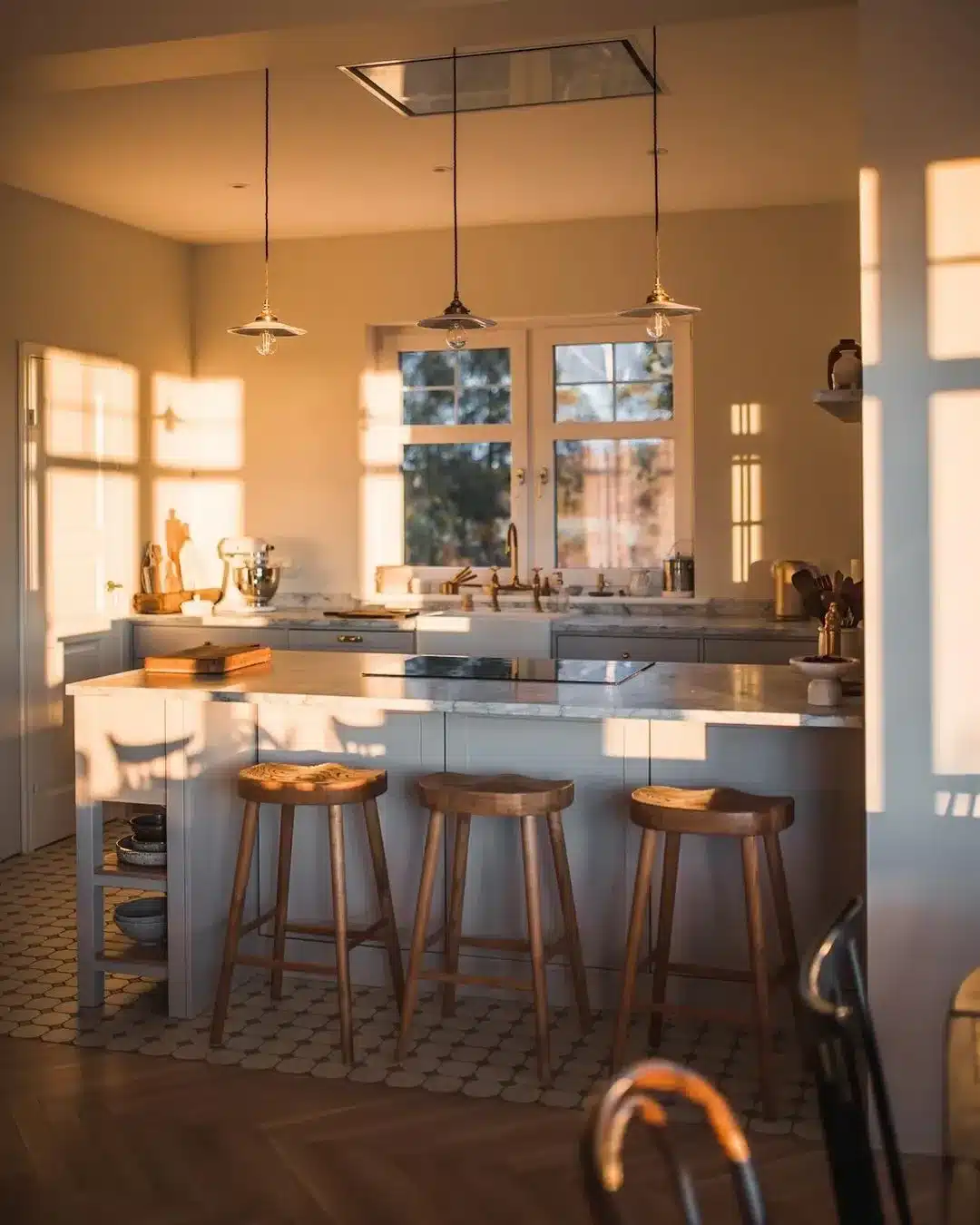 3. Sunlit Neutral Kitchen with Marble Island - simple kitchen ideas