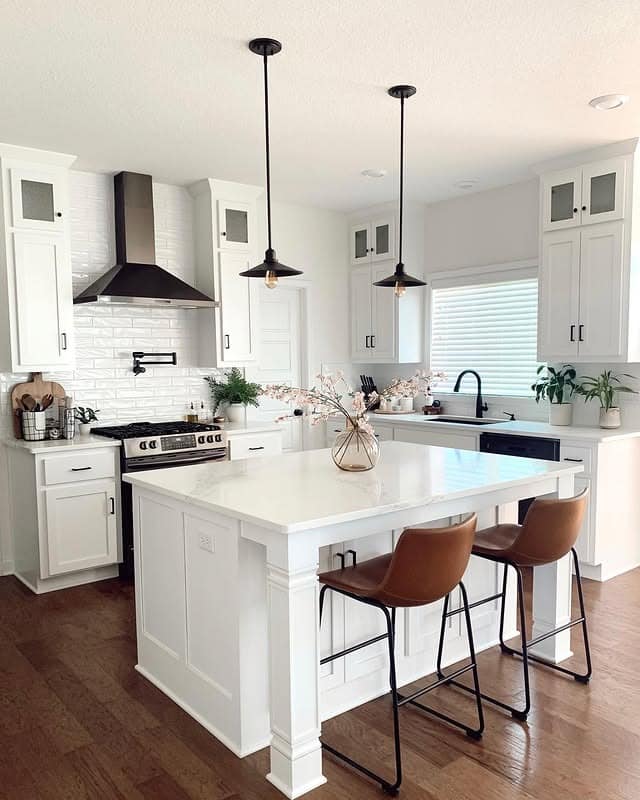 11. Classic White and Black Kitchen with Warm Wood Floors - simple kitchen ideas
