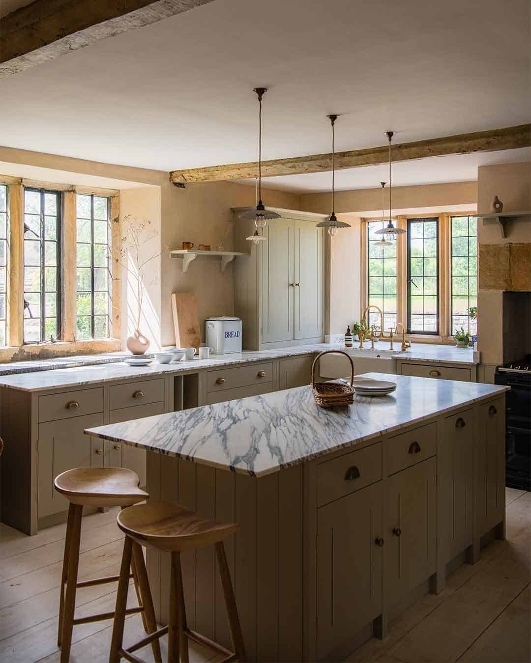 17. English Country Kitchen in Warm Taupe and Marble - simple kitchen ideas