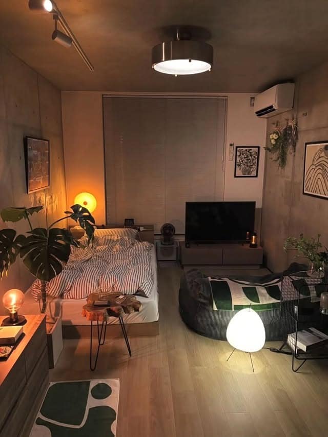 18. Industrial Concrete Bedroom with Compact TV Corner - tv in bedroom ideas