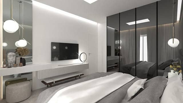 22. Modern White and Charcoal TV Wall with Gloss Wardrobes - tv in bedroom ideas
