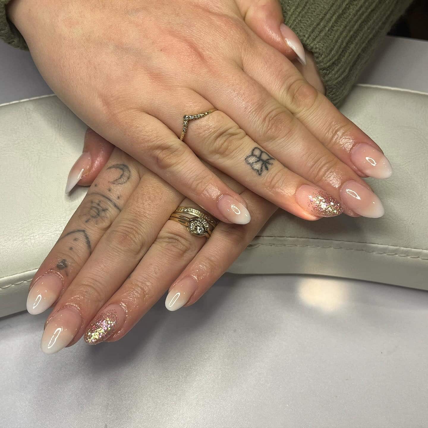 5. Milky White Ombre Glitter Almond Nails - sparkly nail ideas