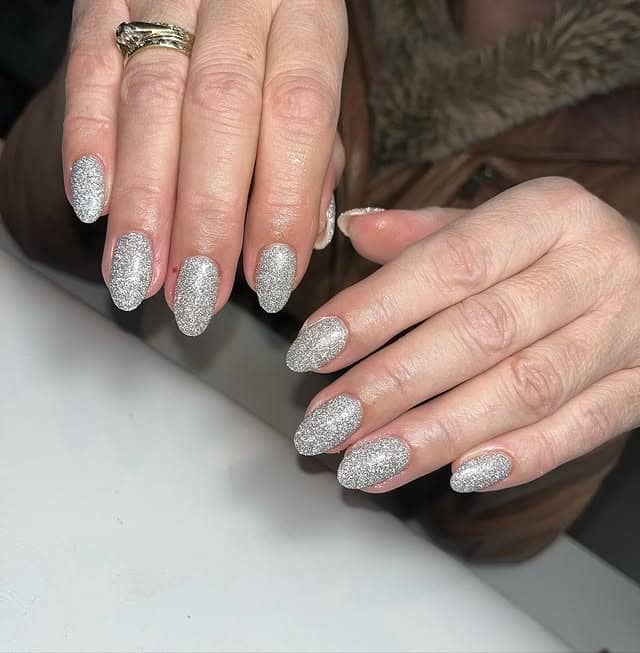 11. Silver Glitter Almond Nails - sparkly nail ideas