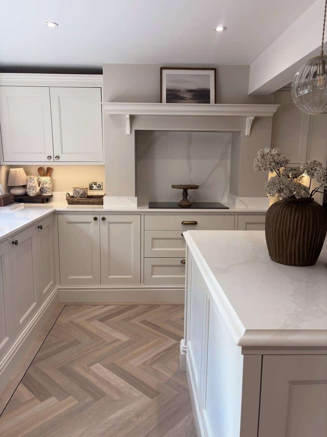 7. Greige Shaker Kitchen with Herringbone Flooring - light color kitchen ideas