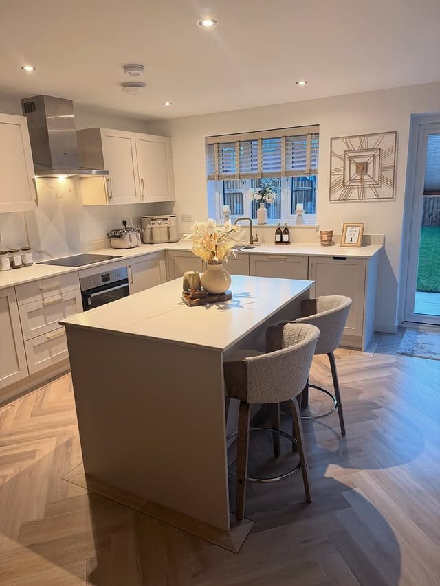 12. Light Gray and White Kitchen with Compact Island - light color kitchen ideas