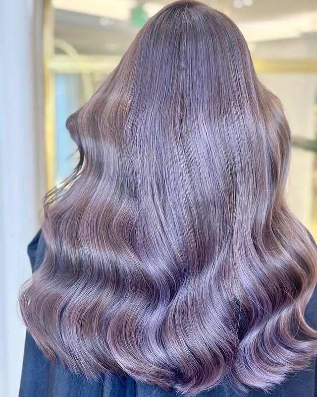 17. Glossy Ash Violet Hollywood Waves - Ash Violet Hair Color