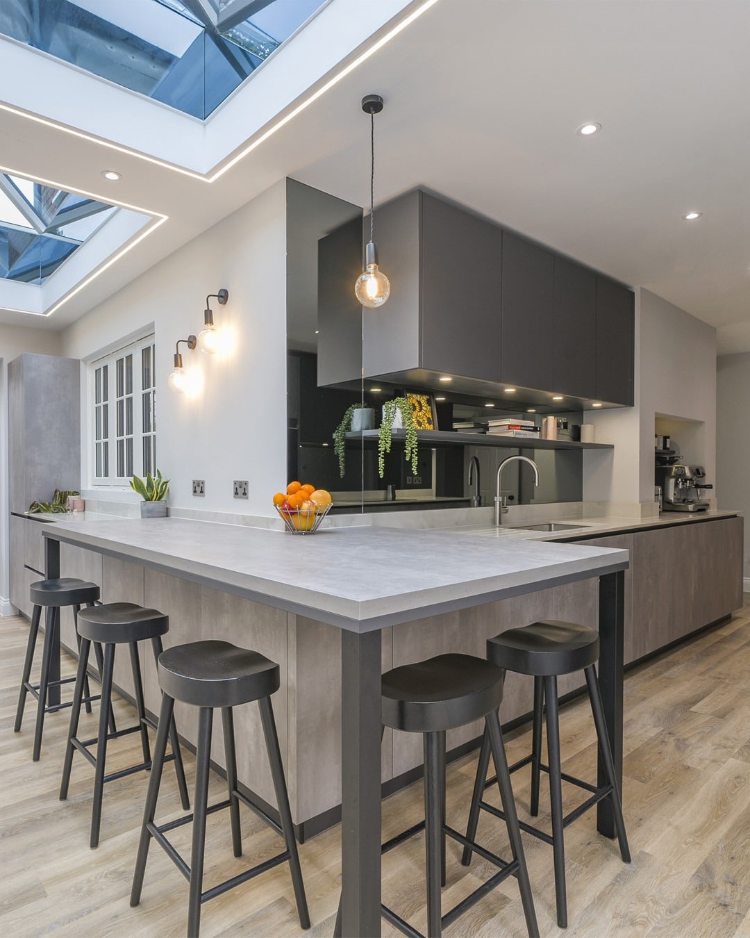 9. Modern Gray Narrow Kitchen with Skylights - narrow kitchen ideas