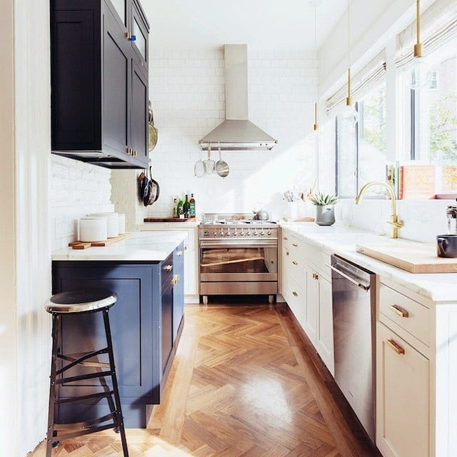 10. Black and White Narrow Kitchen with Herringbone Floor - narrow kitchen ideas