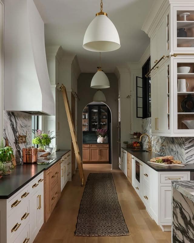 16. White and Marble Narrow Kitchen with Brass Details - narrow kitchen ideas