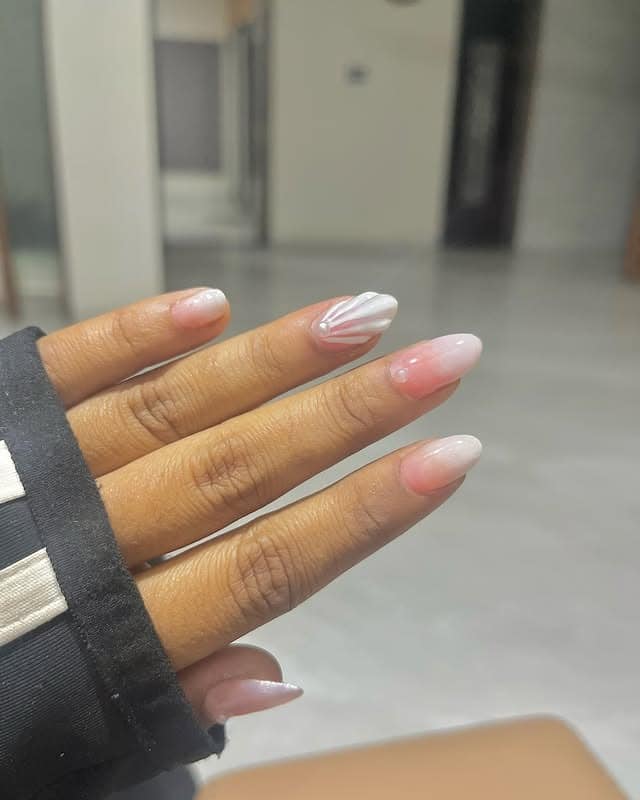 6. Blush Chrome Pearl Almond Nails - trendy simple nail ideas