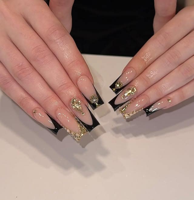 13. Black French Coffin Nails with Gold Crystal Accents - black and gold nail ideas