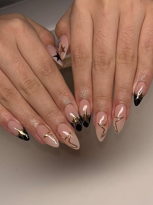 21. Black French Almond Nails with Gold Star Accents - black and gold nail ideas