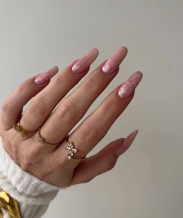 2. Long Blush Pink Glitter Cat Eye Nails - cat eye nail ideas