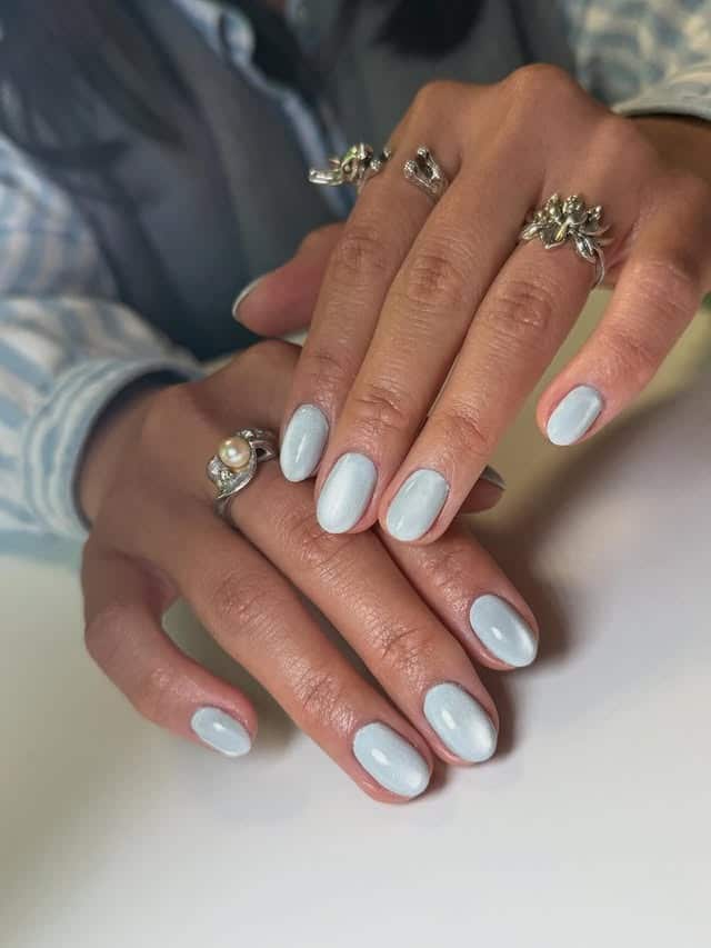 8. Icy Blue Cat Eye Nails - cat eye nail ideas