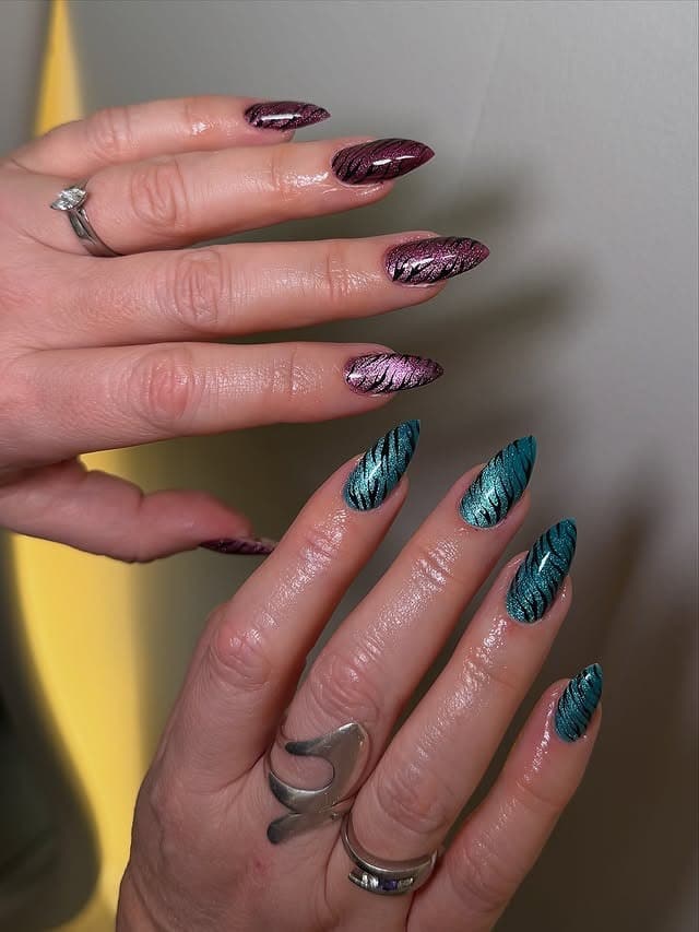 12. Burgundy and Teal Cat Eye Leaf Nails - cat eye nail ideas