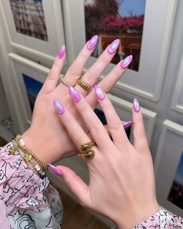 15. Pink Aurora Cat Eye Nails - cat eye nail ideas