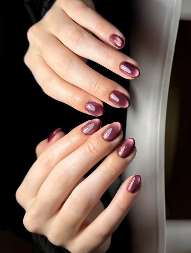 20. Plum Cat Eye Aura Nails - cat eye nail ideas