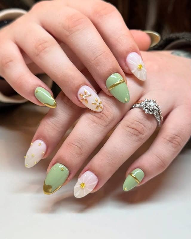 1. Sage Green Floral Almond Nails with Gold Accents - creative nail ideas