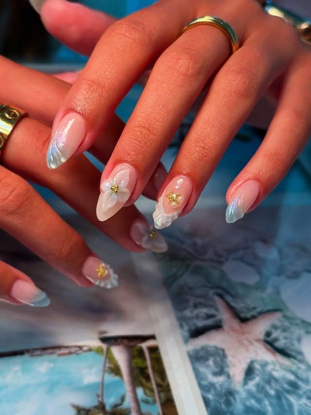 2. Pearl Blue Floral Aura Almond Nails - creative nail ideas