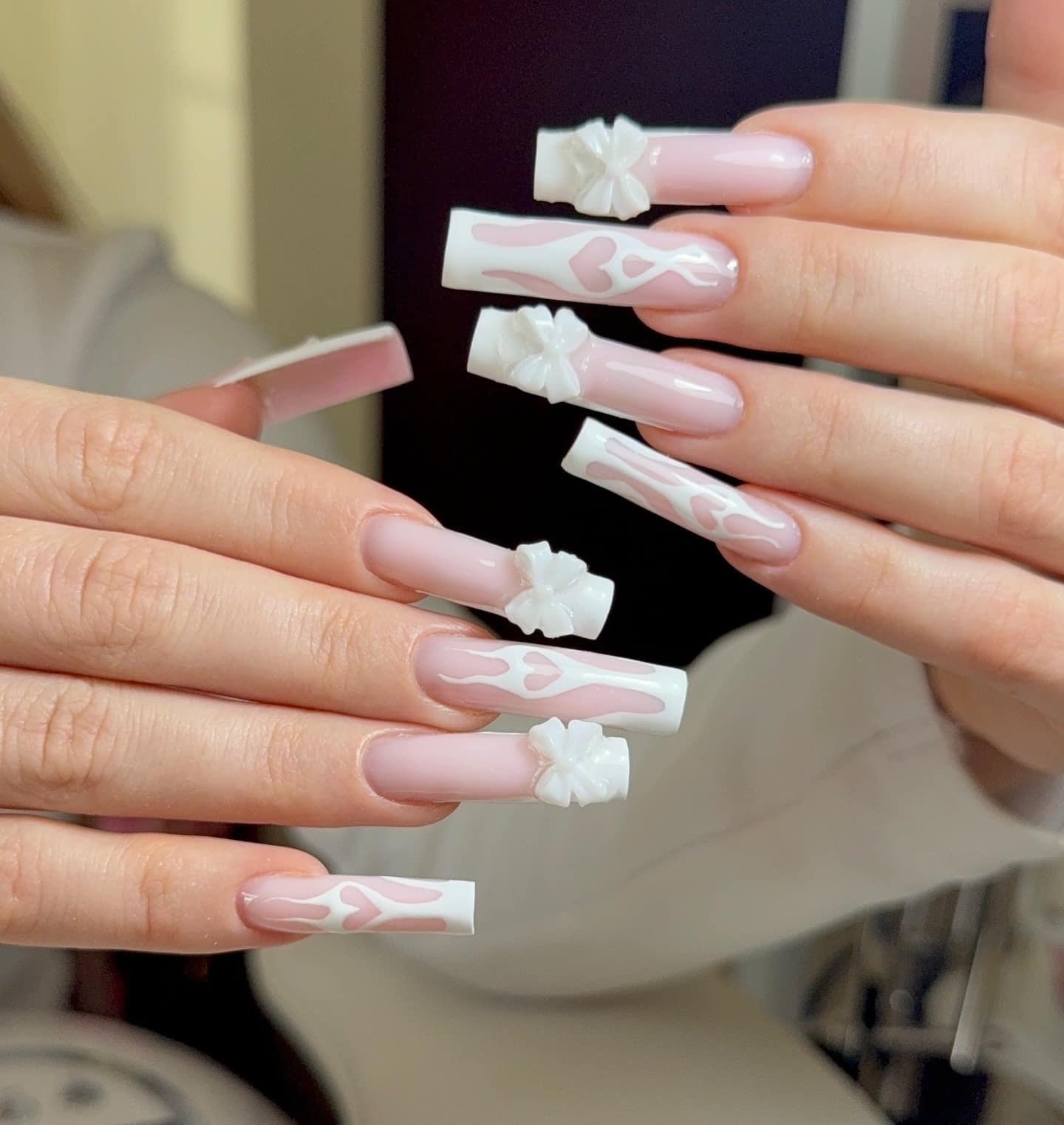 5. Milky Pink French Coffin Nails with 3D Bows - creative nail ideas