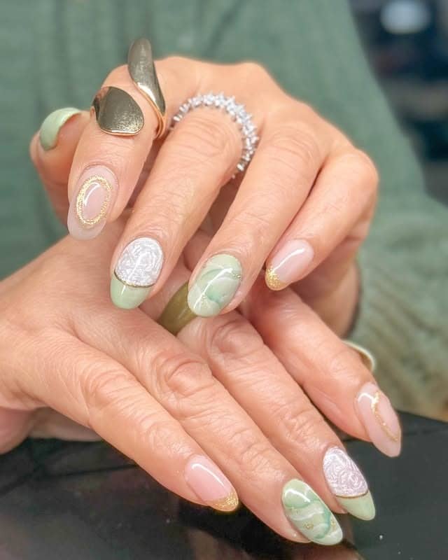 7. Sage Green Marble Almond Nails with Gold Tips - creative nail ideas