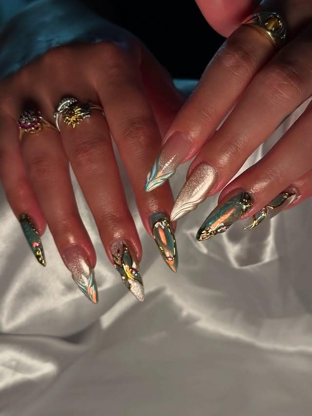 22. Iridescent Chrome Stiletto Nails with Gold Metallic Details - creative nail ideas