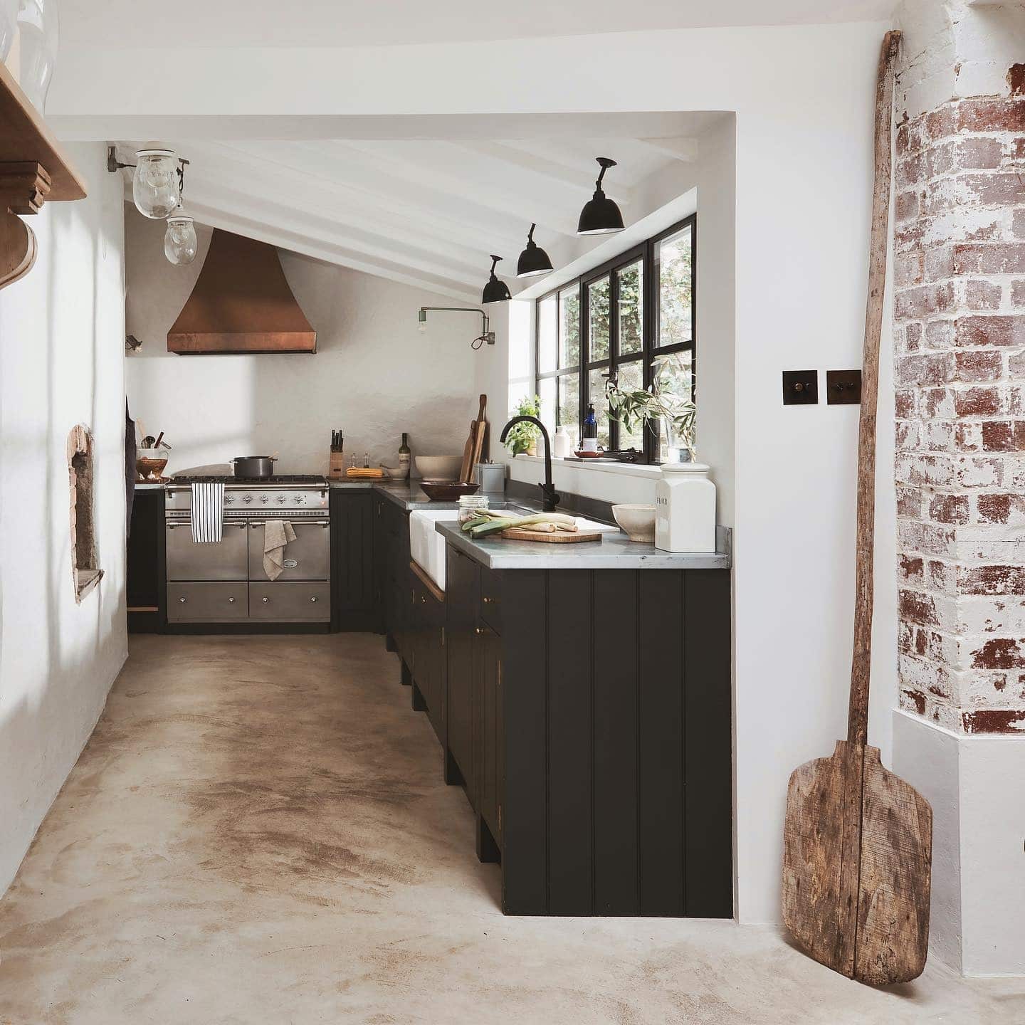 3. Rustic Kitchen Ideas with Black Cabinets and Copper Details - rustic kitchen ideas