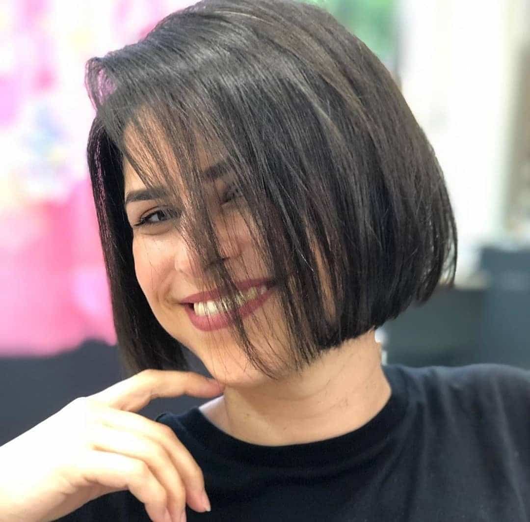 3. Classic Chin-Length Bob with Natural Black Hair - Chin-Length Bob