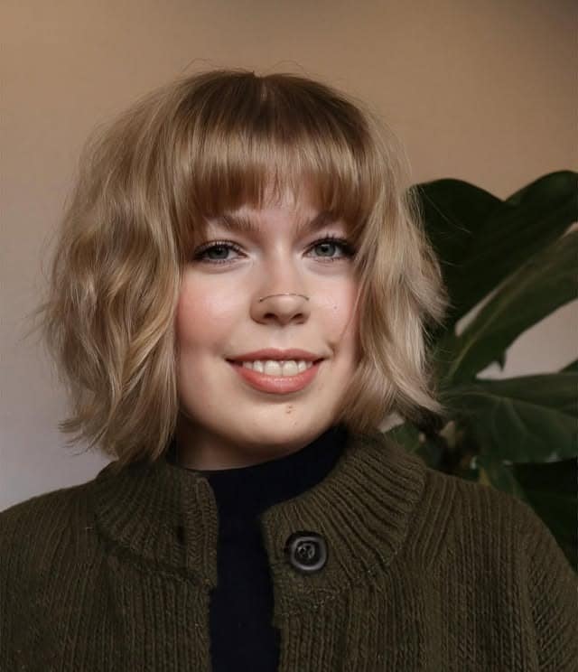 21. Wavy Chin-Length Bob with Sandy Blonde Hair - Chin-Length Bob