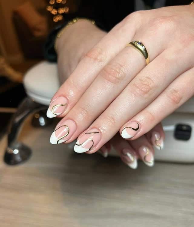 4. White French Gold Ribbon Almond Nails - elegant nail art ideas