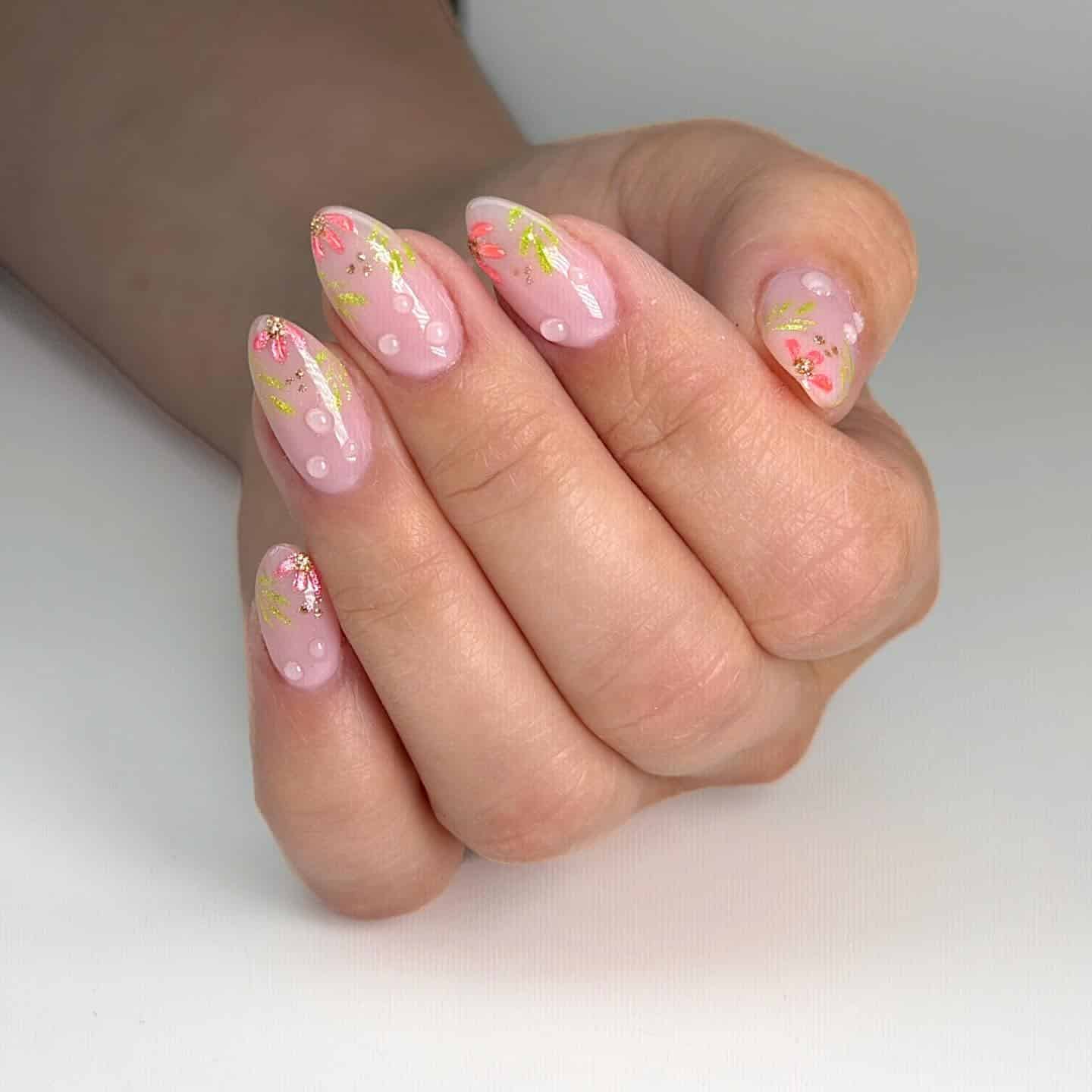 5. Delicate Pink Floral Almond Nails - elegant nail art ideas