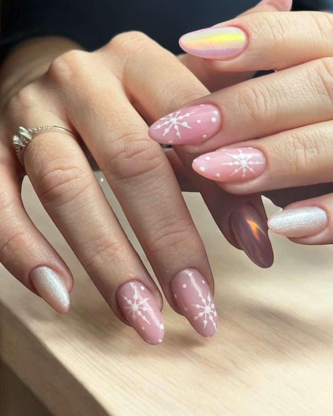 6. Pink Snowflake Pearl Almond Nails - elegant nail art ideas
